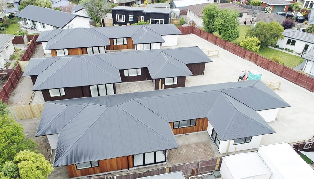 Completed houses for all three town houses in Vivian Street, Christchurch, each with 140m2 floor area consisting of 3 beds, 1x bath and en-suite, single garage with storage, and Garden area